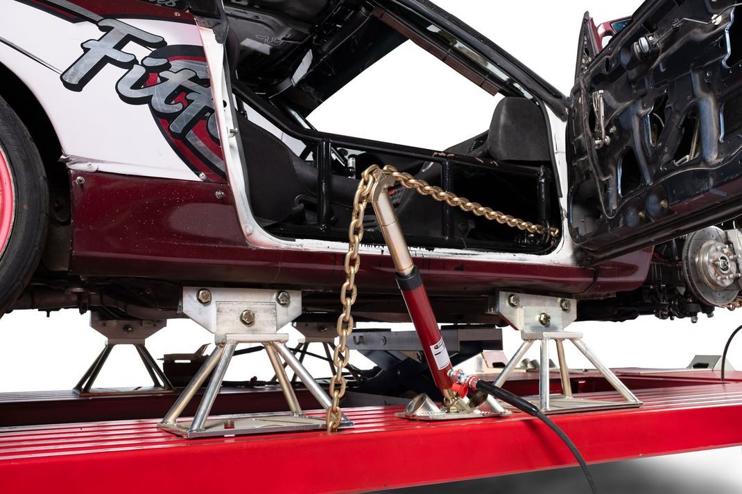 Door-opening pull with chains and clamps